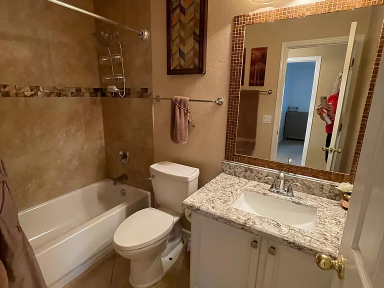 Hallway FULL Bathroom with new granite, sink, plumbing, tiled shower area and ADA toilet!