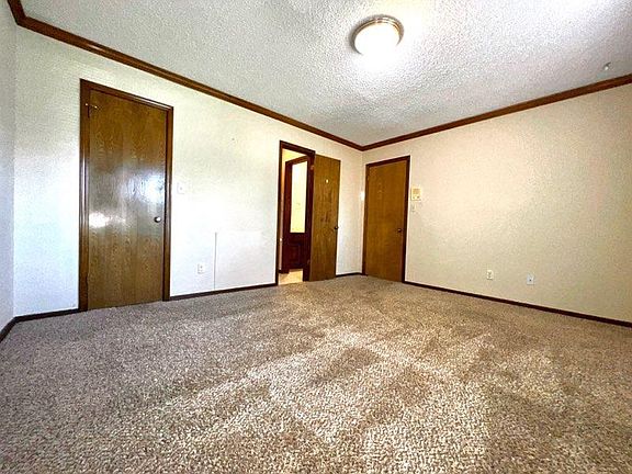 master bedroom
showing the closet, entry to bathroom, main entry