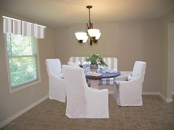 Formal dining room overlooks back yard!