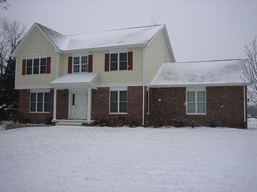 Spacious front yard just waiting for a snowman