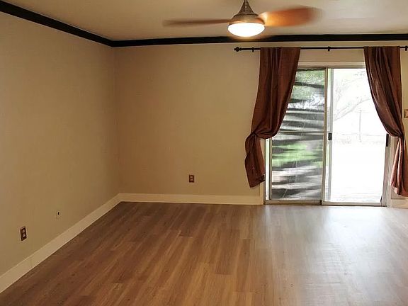 View of living room and door to backyard.