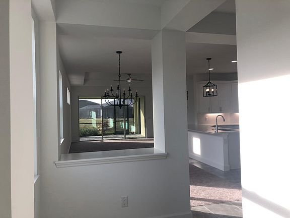 Front foyer view toward the great room, dining room and kitchen