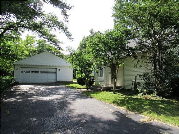 The oversized 2 car detached garage is perfect for storage or a workshop.