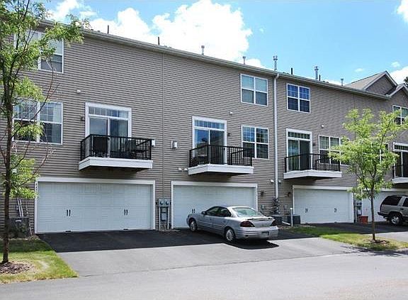 Back of townhome with deck