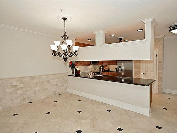 Extra deep 7.25 inch Base Moulding throughout the home adds elegance. 