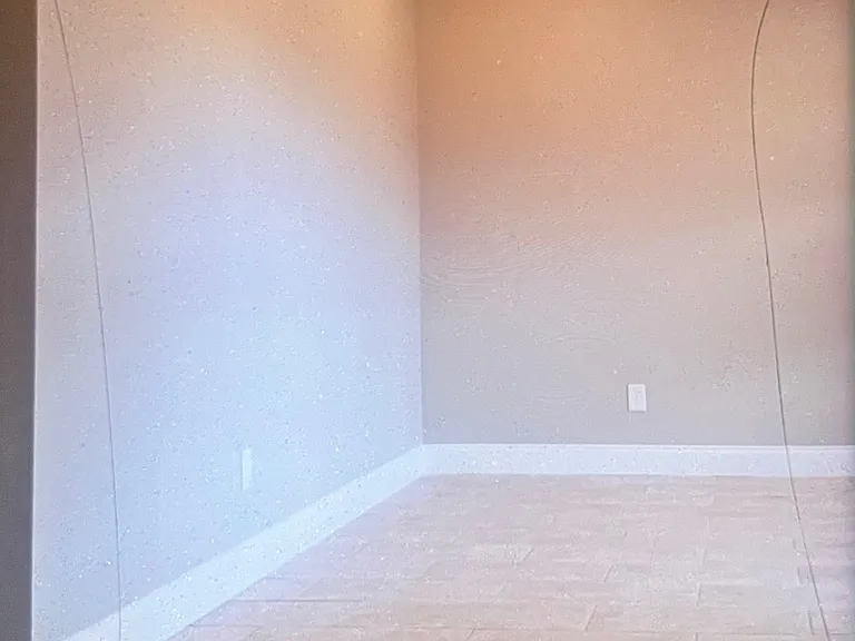 Large living room off of the front hallway: vaulted ceilings with great light.
