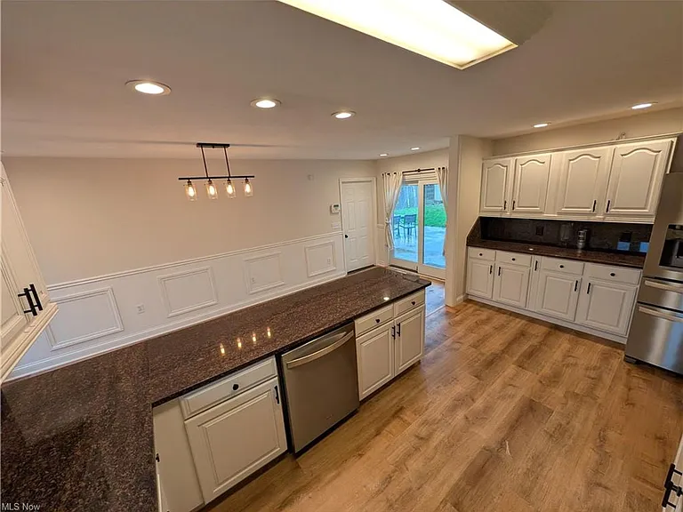 8645 Courtland Dr — Photo 4
