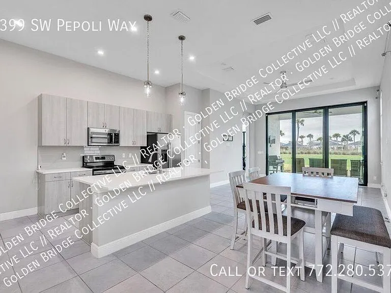 9399 SW Pepoli Way — Photo 2