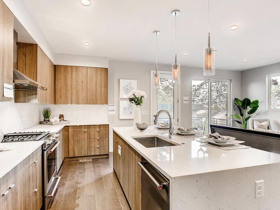 large kitchen island perfect for entertaining. Currently, we actually have 5 counter stools around it