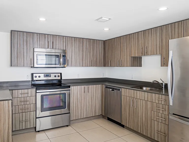Kitchens with stainless steel appliances