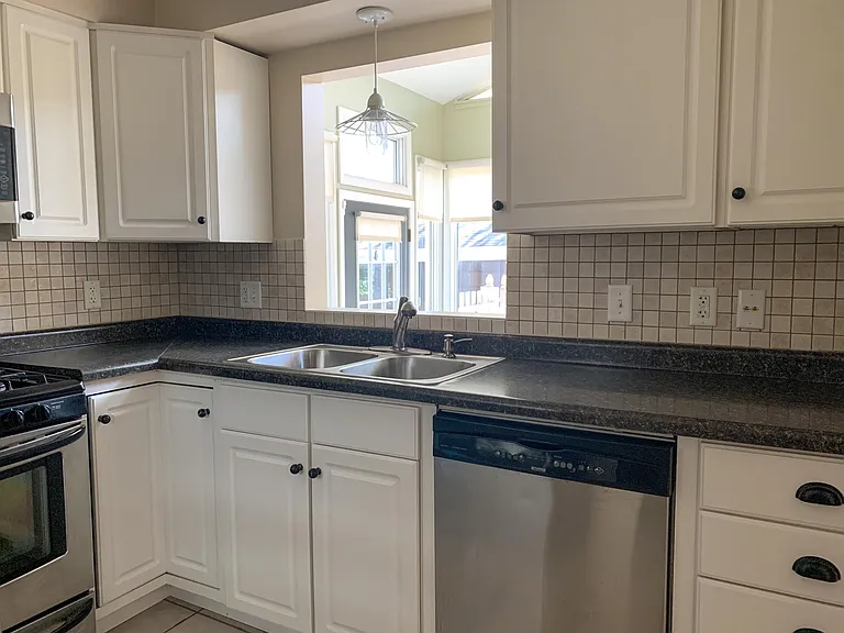 Kitchen - Stainless appliances, new refrigerator 2024.