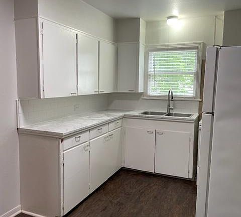 View of kitchen from back door.