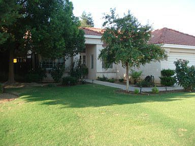 Beautiful Home, tile roof, landscaping and mature trees