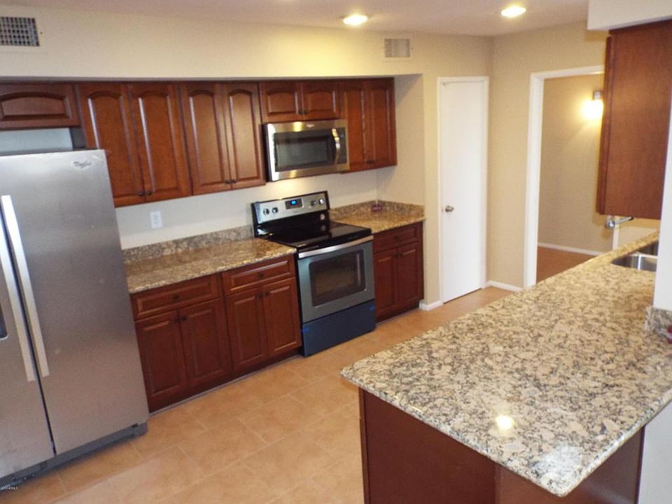 1st image of 9029 N 109th Ave