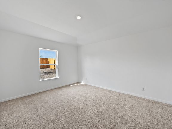 The master retreat has its own bathroom and walk-in closet