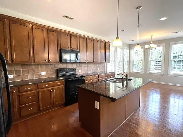 10345 Falling Leaf Dr NW — Photo 3