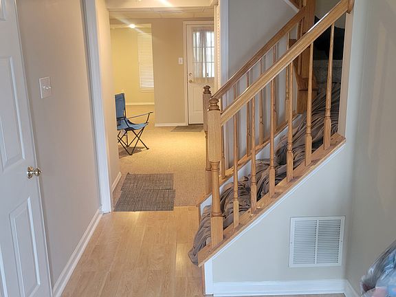 Foyer, garage to left, powder room to right , straight ahead is rec room.