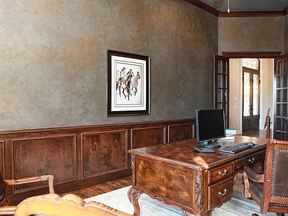 Double French Doors welcome you to this stunning Study