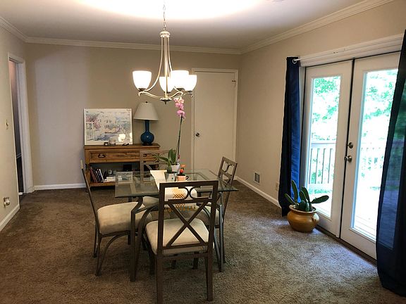 Living or dining off deck with access to full basement and hall