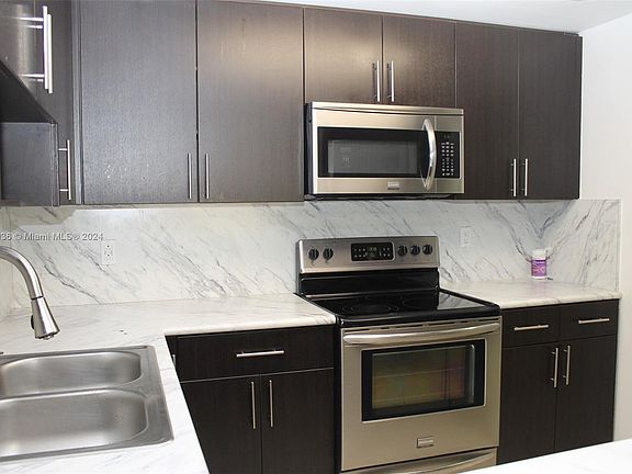 5th image of 7000 NW 186th St APT 4-218