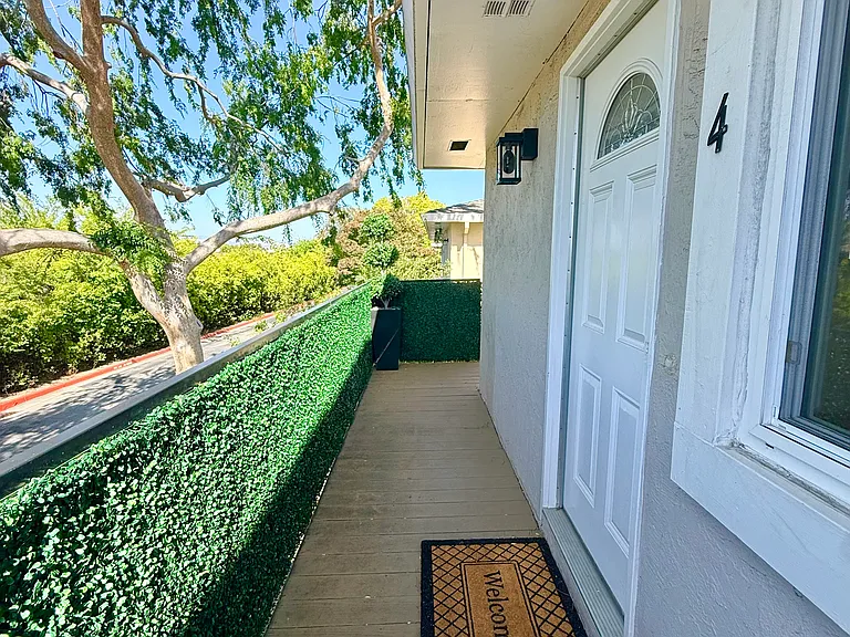 Tranquil tree-lined views from the balcony deck