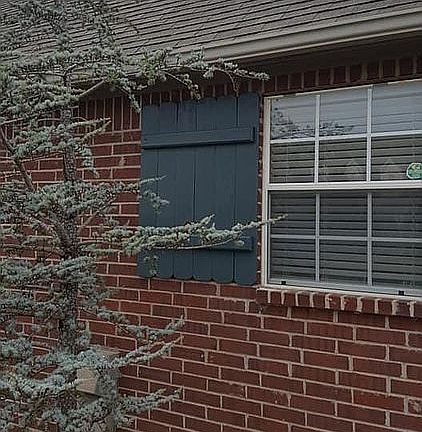 Full brick - landscaped front yard