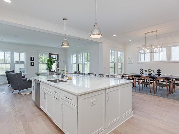 This is a photo of a completed version of the same exact floor plan and the same designer finishes - representative only.