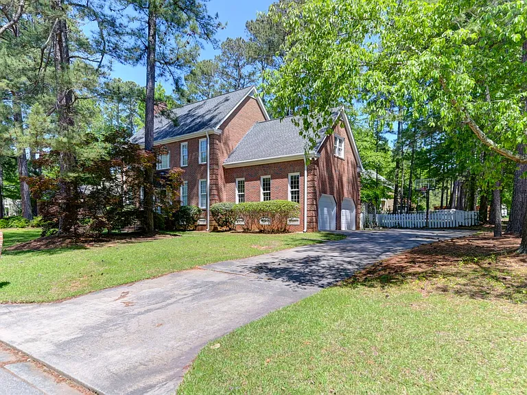 1100 Woodtree Ct — Photo 3