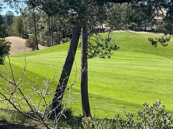 5th image of 210 S Rim Club Dr