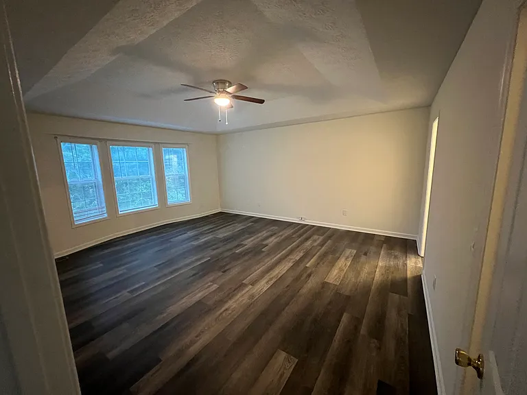 Extra large Master bedroom (approx 24x18) with vaulted ceilings, ceiling fan, with walk-in closet and on-suite bath that had double vanity sinks, soaking tub separate from standing shower & toilet within the bathroom.