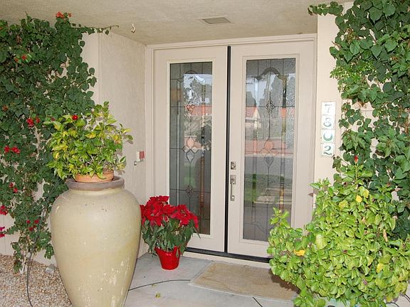 Welcoming Entry w/Custom Glass Doors