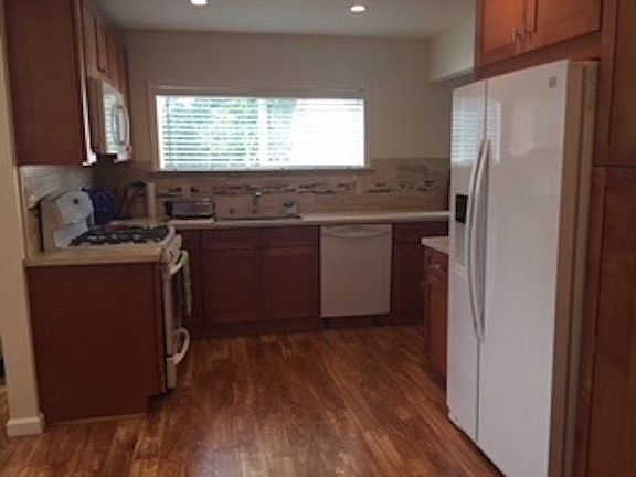 Remodeled kitchen with gas cooktop