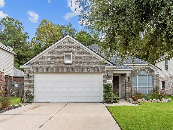 Garage includes upgraded garage door opener and numerical keypad on right side of garage.