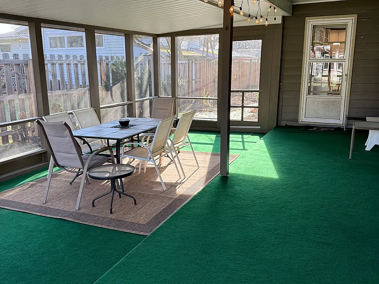 The screened in porch is a great place to hang out or study
