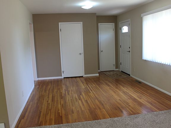 Living area with hardwood floors