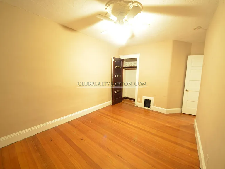 bedroom 2 (2 closets, 2 windows)