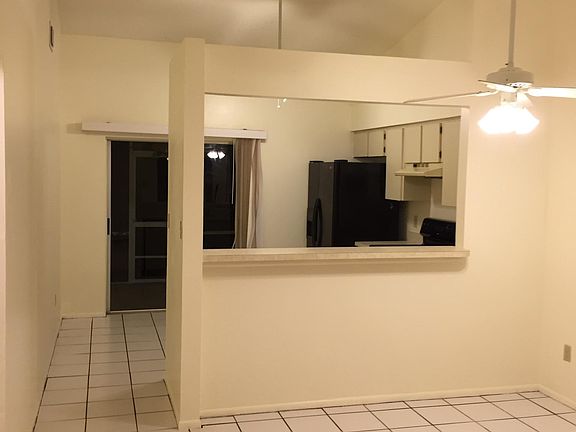 Dining area to Kitchen and Screened Porch