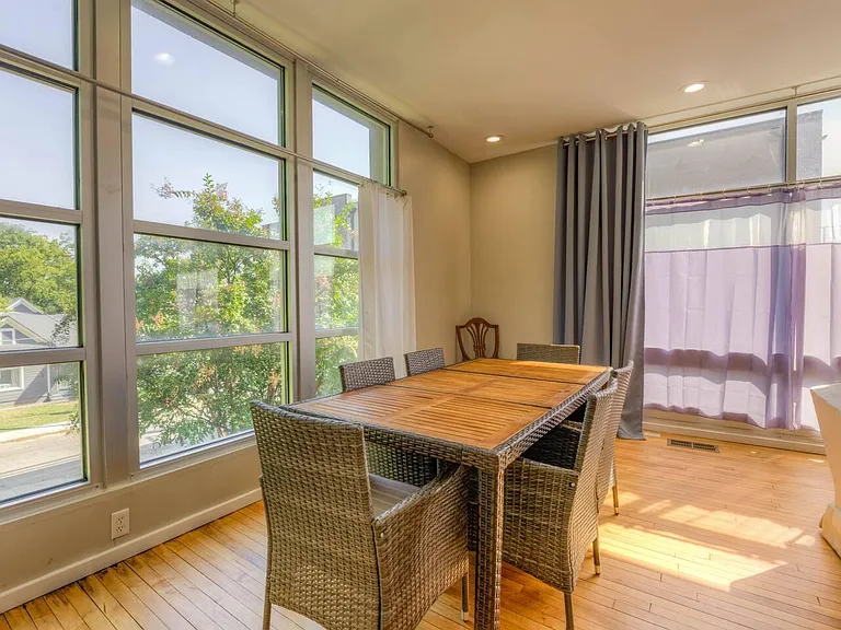 Dining area with natural light and seating for 6-8