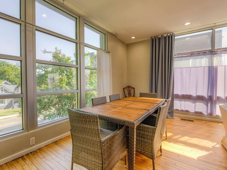 Dining area with natural light and seating for 6-8