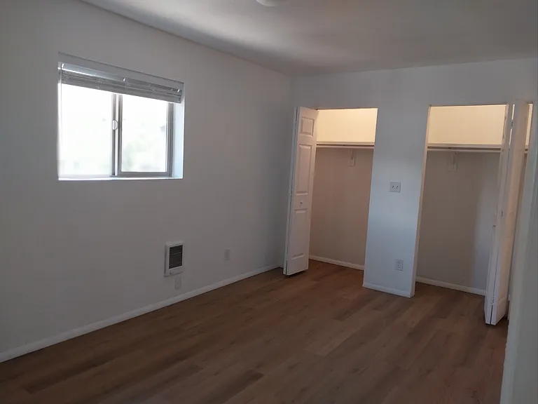 Two closets in master bedroom