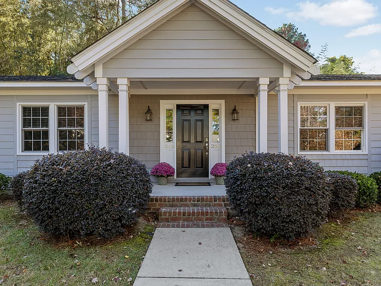 Main door opens to entry area where front doors to each side are located.
