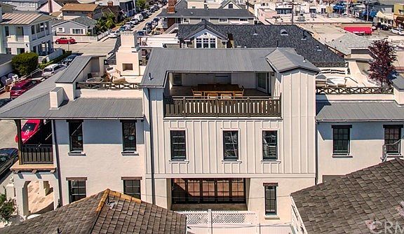 Side view of home showing roof decks