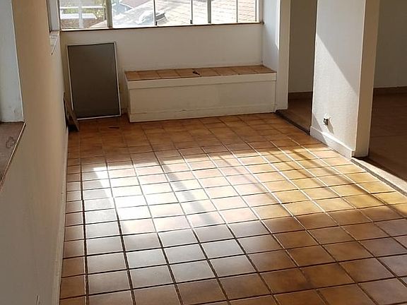 Upstairs enclosed patio with view