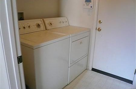 Ground floor laundry room, door to garage.