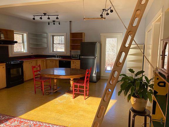 Open floorplan and winter sunshine create a sense of cozy spaciousness in the great room.