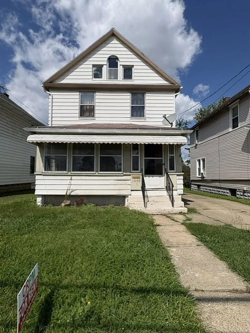 Spacious 4-Bedroom Barberton Home with Enclosed Front Porch — Photo 1