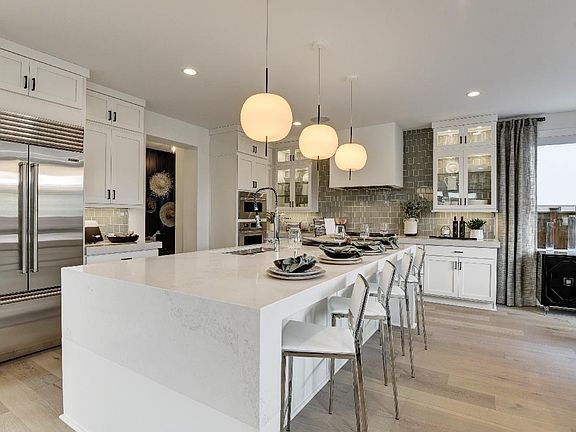 Spacious kitchen offers a large center island and plenty of storage