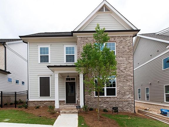 Not actual home. Photo of previously built Charleston plan. Big welcoming porch. This home will be p