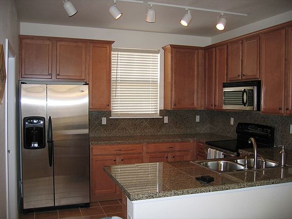 Granite countertops, maple cabinets
