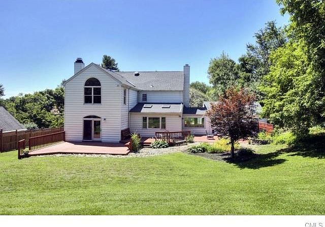 1,000 Square Feet of Decking spans entire back of home.  Room for inground pool in fully fenced yard.